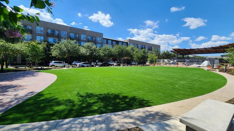 Artificial turf lawn in an apartment courtyard