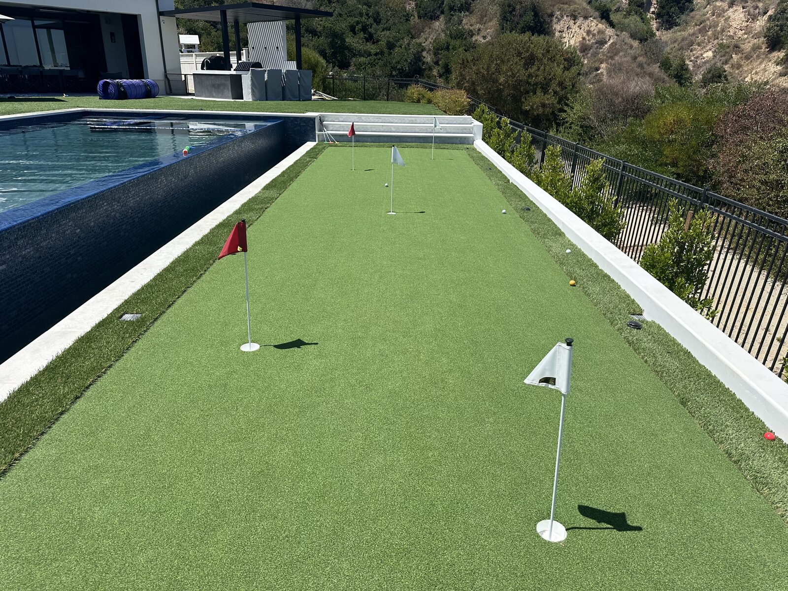 SGS Turf install &mdash; Putting Green &middot; Poolside